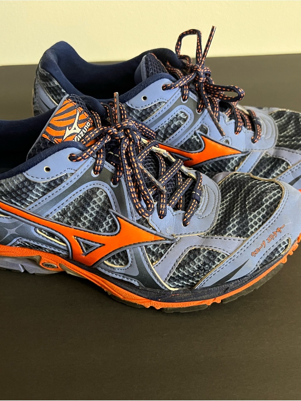 Mizuno women's Athletic Trainers in Navy and Orange Accents